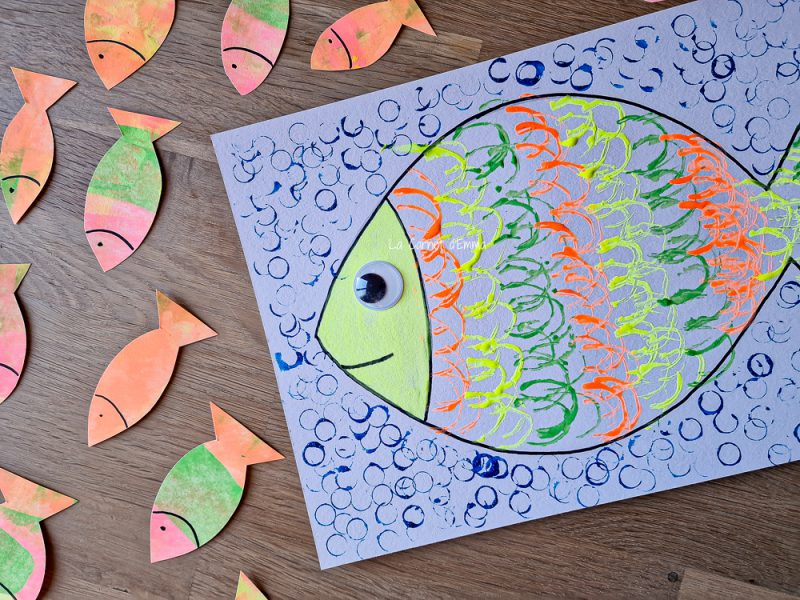 Un poisson avec des écailles à la peinture fluo