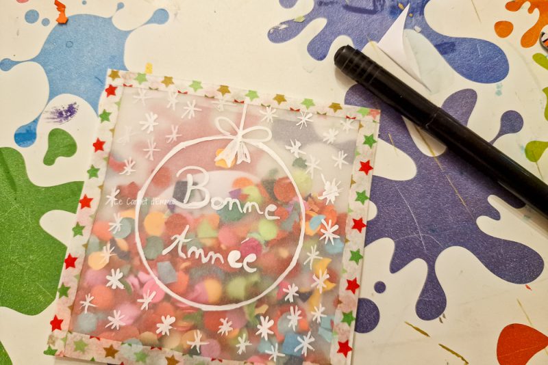 activité manuelle carte de voeux bonne année avec des confettis